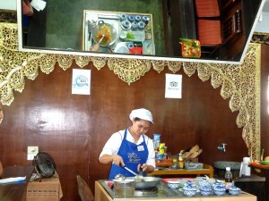 One of our chefs teaching us how to make Tom Kha Kai, chicken in coconut milk soup.