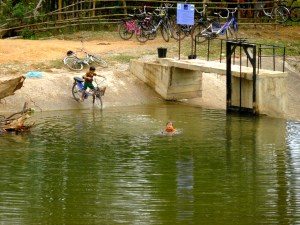 These kids ride their bikes right into the river … both they and the bike get a bath.  