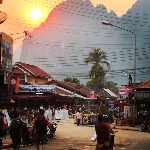 Sunset over the mountains from Vang Vieng town center.