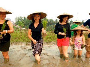 All lined up to plant our rice seedlings.