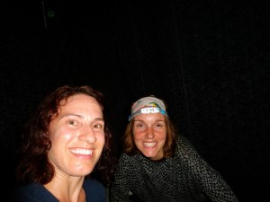 Julie and I playing cards with flashlights under our mosquito net. 