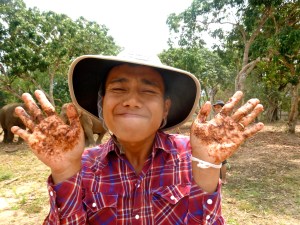 Sunshine after feeding tamarind to the elephants. 